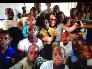 Joie Pirkey with Rwandese children